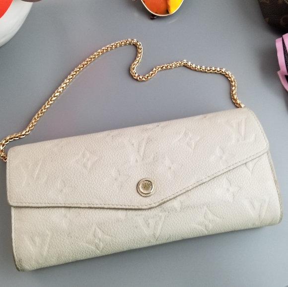 LOUIS VUITTON Portefeuille Empreinte Neige Mono - Picture 7 of 16